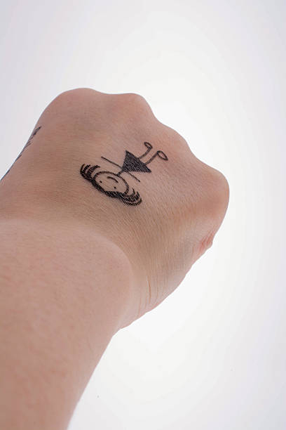istock Girl figure drawn on a finger tip 614246752