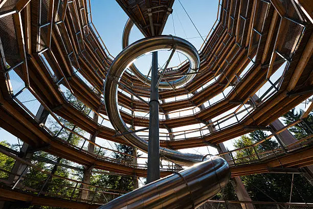 wooden lookout in black forest in Bad Wildbad in Germany. You can walk up a wooden path to a height of 50 m than you can walk down or ride down in a twisted slide.