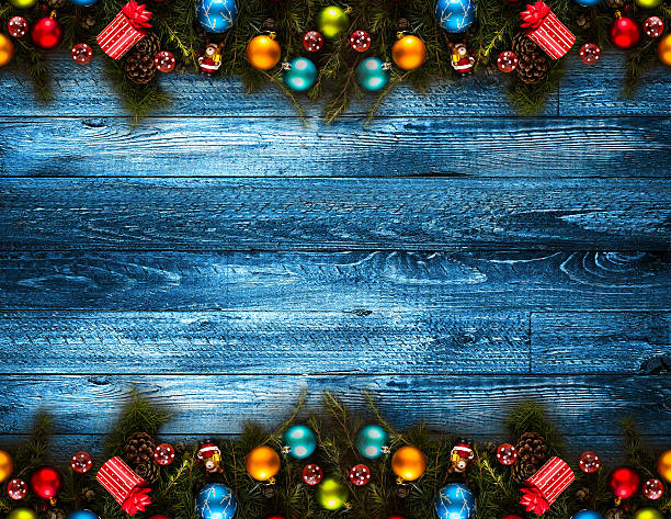 istock Merry Christmas Frame with real wood and colorful baubles 614247808