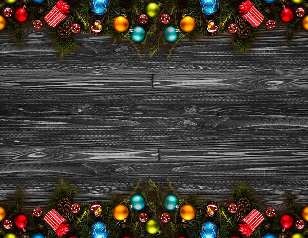 istock Merry Christmas Frame with real wood and colorful baubles 614248938