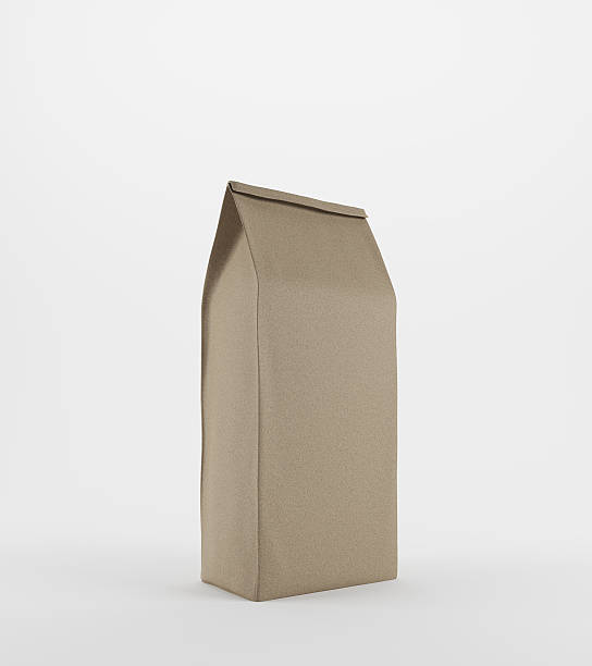 istock Beige lunch paper bag standing on white background 614252812