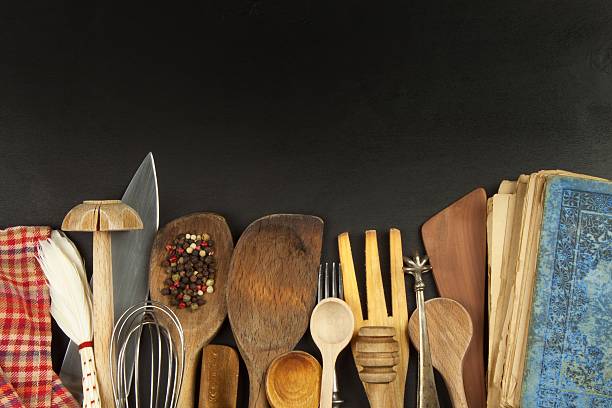 istock Kitchen utensils on wooden table. Tools cook. Needs to cook. 614302870