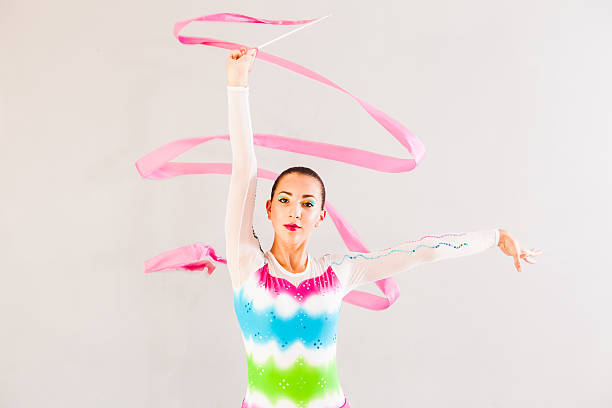 istock gymnast with ribbon 614303048