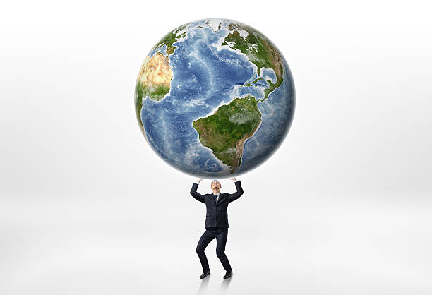 istock Businessmen holding the Earth up above himself on a white 614303546