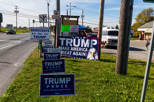 Ronks, Pa, United States - October 11, 2016: Trump campaign signs offered for sale by a vendor along busy Route 30 in Lancaster County.