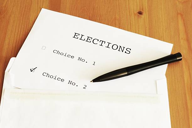 istock The ballot on the table with a pen 614305606