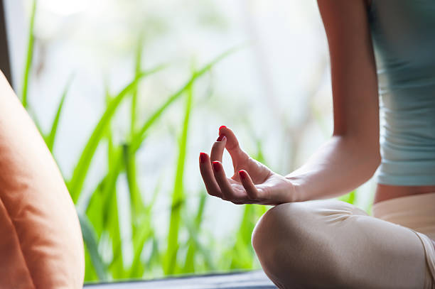 istock Woman doing yoga 614306106