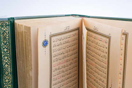 The Holy Quran on a white background