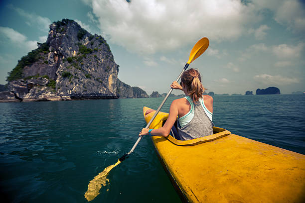 istock Woman with the kayak 614306524