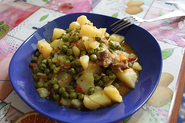 Traditional stew with patatoes and pease stock photo