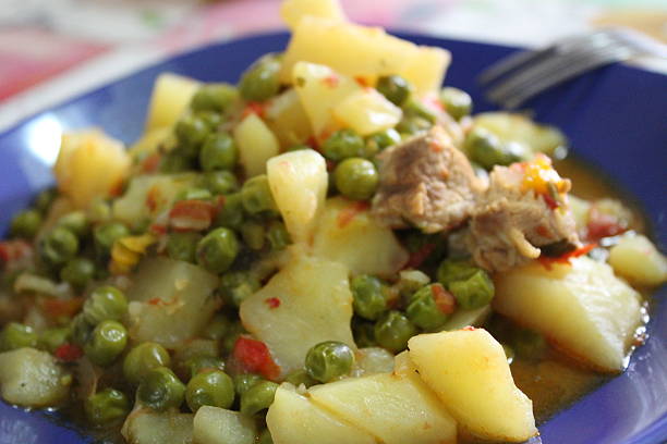 Traditional stew with patatoes and pease stock photo