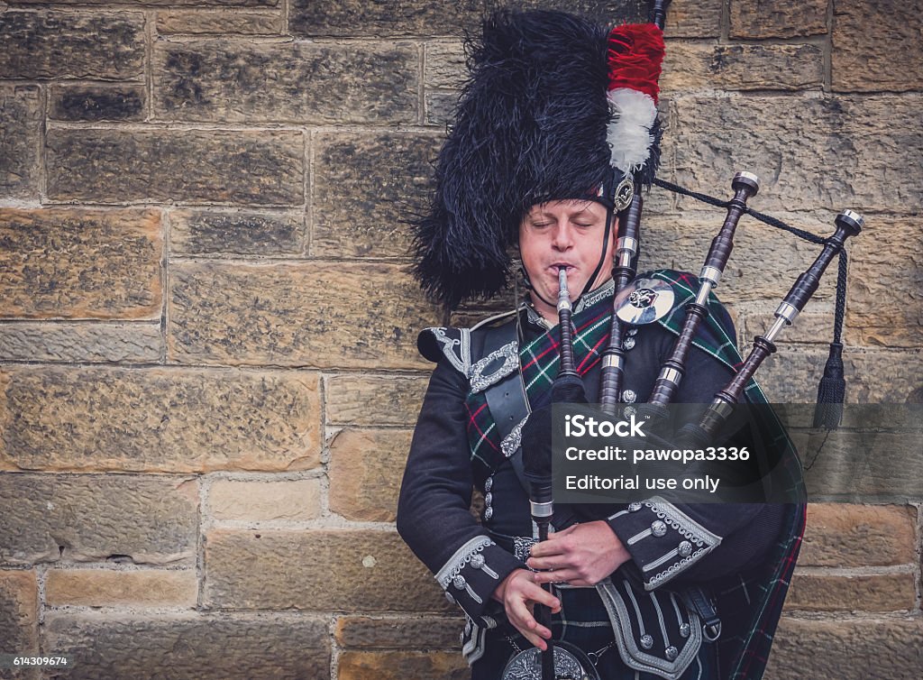 Man playing bagpipes in Edinburgh Edinburgh, Scotland - 02 September 2016 : Man playing traditional pipes on the streets of Edinburgh Bagpipe Stock Photo Man playing bagpipes in Edinburgh Edinburgh, Scotland - 02 September 2016 : Man playing traditional pipes on the streets of Edinburgh Bagpipe Stock Photo