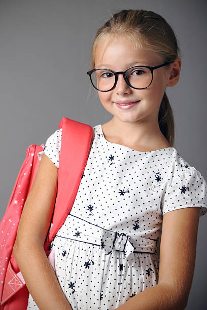 istock Little girl with backpack ready for school 614310338