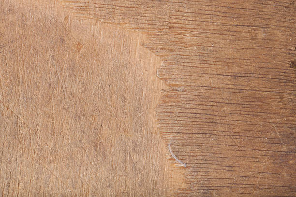 istock Textured surface of old wooden cutting board 614310828