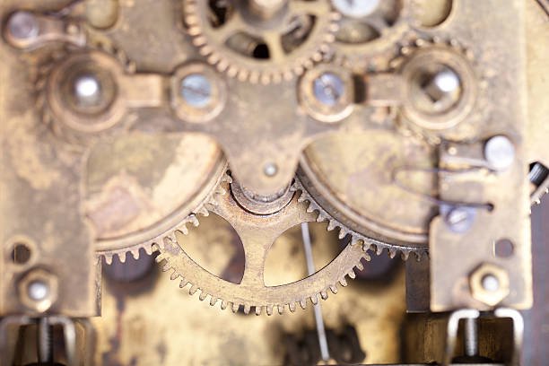 istock Old clockwork dirty with dust and lubricating oil. Selective foc 614311764