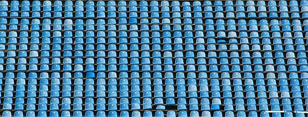 Empty rows of blue stadium seats