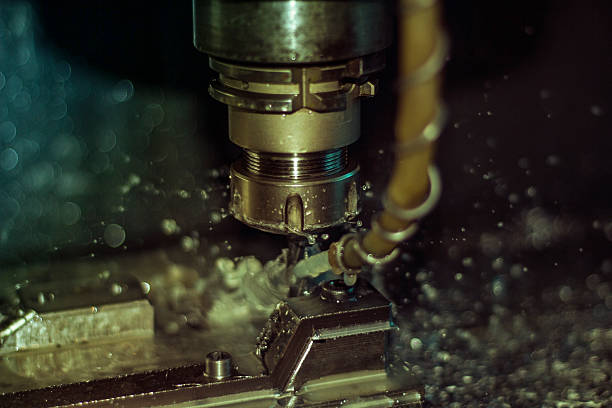 istock Metal forming by CNC milling machine cutting 614316016