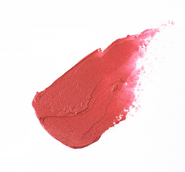 istock Red colour lipstick stroke on white background 614316224