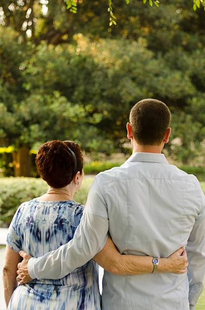 istock Mother and son walking through life 614316948