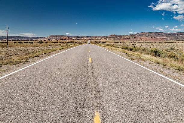 istock Highway through the desert foothills 614317650
