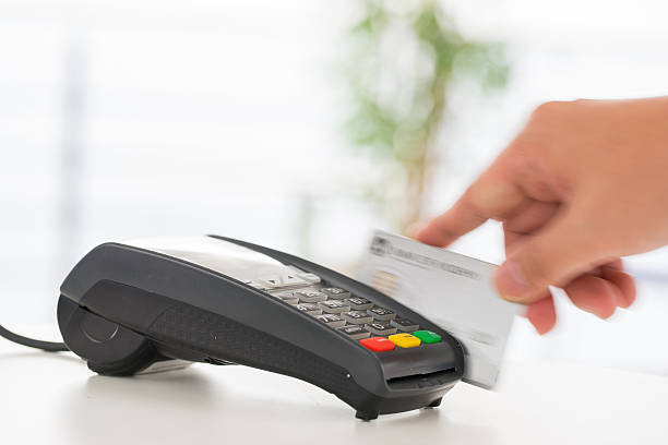 istock Credit card machine, payment for online shopping 614319054