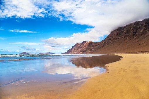 Famara Beach, popular surfing beach in Lanzarote. Canary Islands. Spain. 
