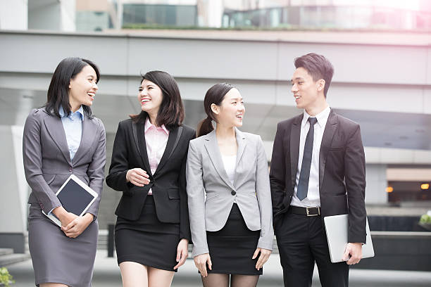 istock businesspeople talk in office 614322756