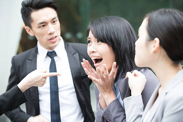 istock business people bullying 614323154