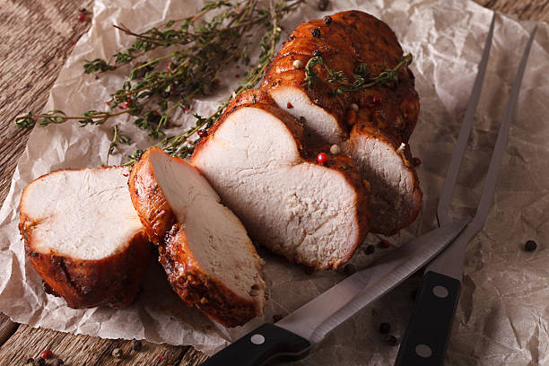 istock Turkey fillet roasted close-up on the table. horizontal 614325476