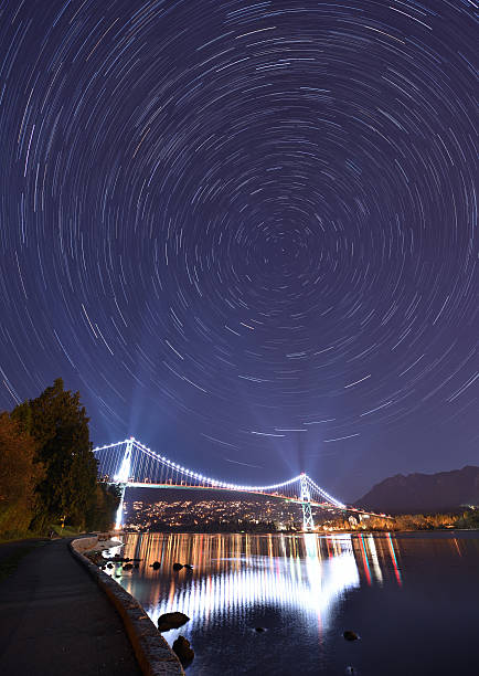 istock Lions Gate Bridge and Star Trails, Stanley Park, Vancouver 614327114