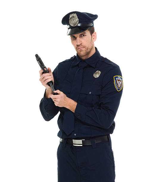 istock Police in action with gun 614327730