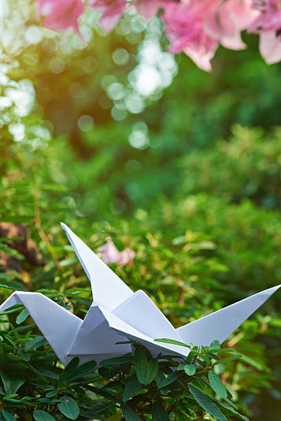 istock white paper origami crane 614328100