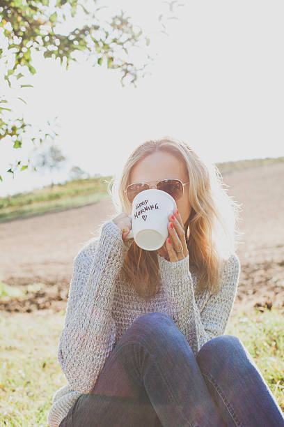 istock Woman with cup of coffee 614328218