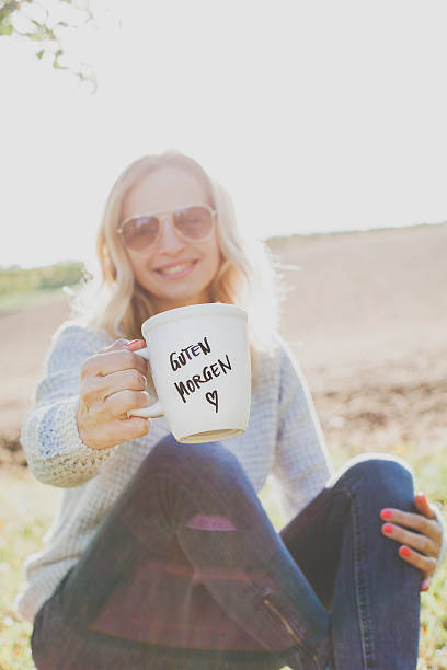 istock Woman with cup of coffee 614328376