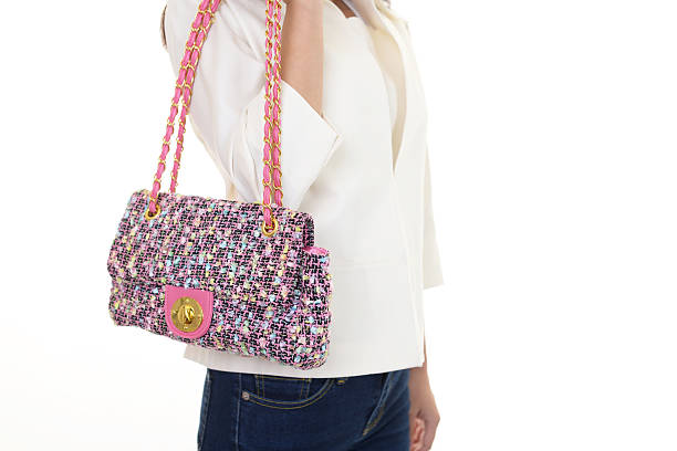 istock Woman with a shoulder bag 614332786