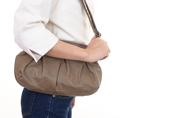 istock Woman with a shoulder bag 614333112