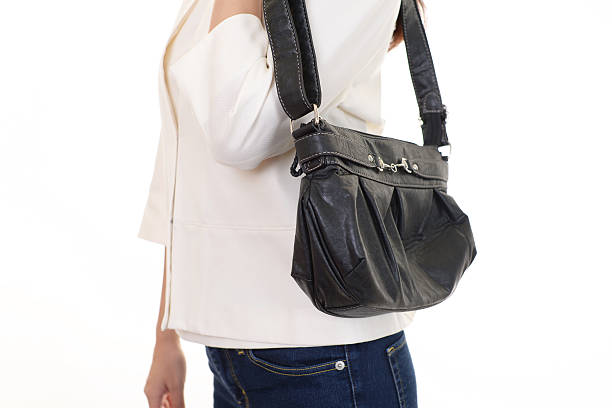istock Woman with a shoulder bag 614333552