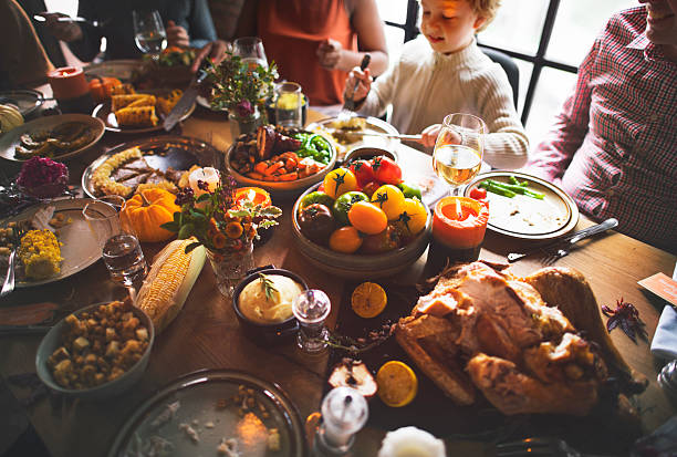 istock People Celebrating Thanksgiving Holiday Tradition Concept 614334558