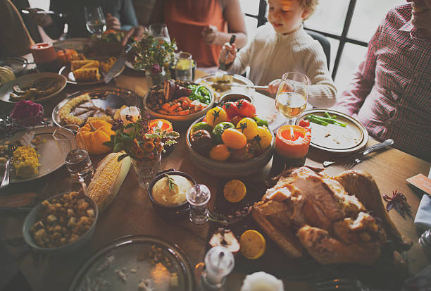 istock People Celebrating Thanksgiving Holiday Tradition Concept 614334760