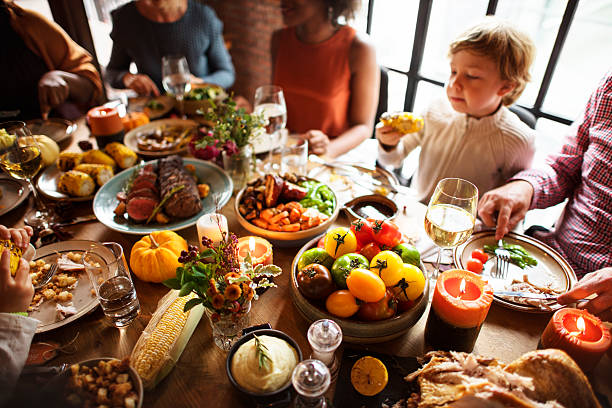 istock People Celebrating Thanksgiving Holiday Tradition Concept 614338196