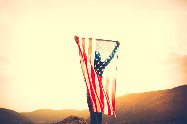 Woman holding a flag.