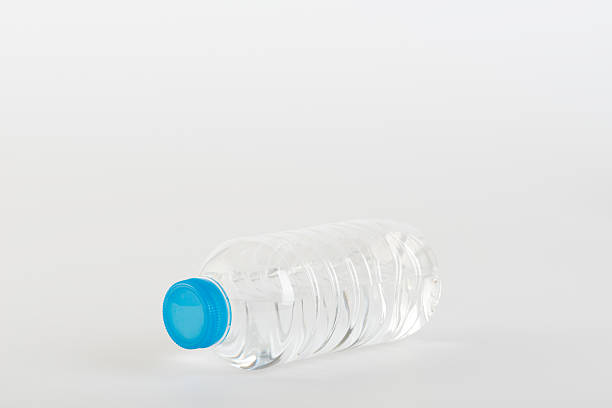 istock Recyclable garbage of plastic bottles on white background 614347278