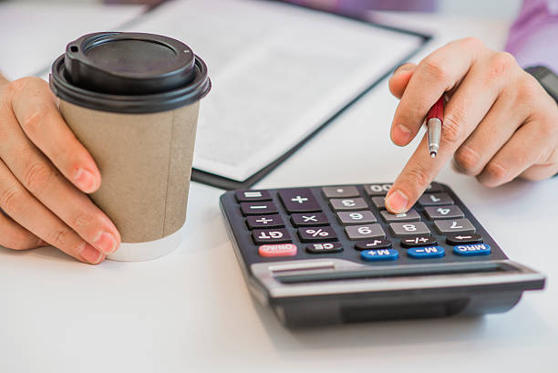 istock Business man or accountant lawyer working on documents, close up 614349036