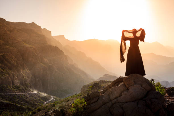 istock Omani woman in the mountains 614349106