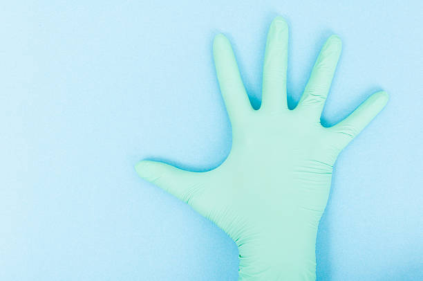 istock Medical latex glove 614349932