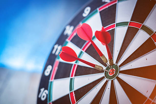 istock Red dart arrow hitting in the target 614403352