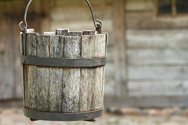 istock wooden bucket water 614403502