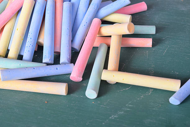 istock color chalk on green board 614403574