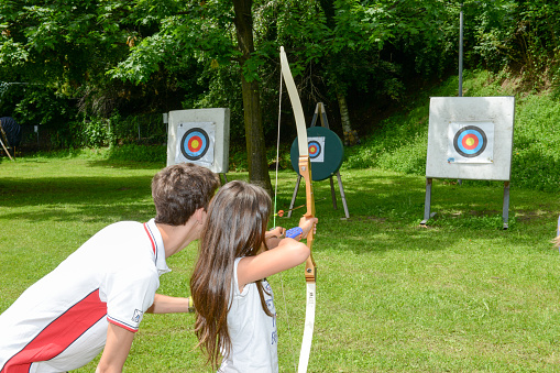 Massagno, Switzerland - 13 June 2016 - people who are learning to archery at Massagno on the italian part of Switzerland