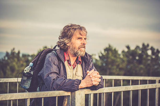 istock Senior Man Hiking Portrait 614405310